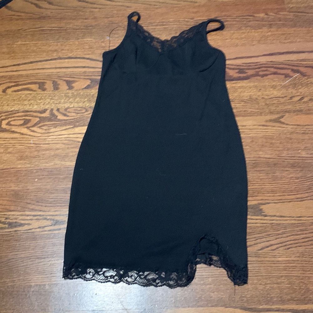 Black bodycon lacy dress with a slit